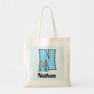 Bolso De Tela Monograma N de niño con un oso de peluche azul