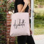 Bolso De Tela Monograma Rubor Pink<br><div class="desc">Haga una declaración con esta impresionante bolsa de algodón blanco y negro con monograma. Este elegante bolso ofrece letras de guiones modernas en un diseño elegante que le dará la vuelta a la cabeza dondequiera que vaya. Con mucho espacio para sus necesidades básicas y un estilo único, esta bolsa se...</div>