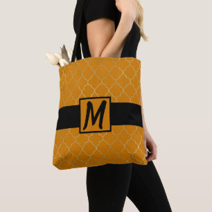 Bolso De Tela Monogramado de cuatrefoil dorado y amarillo últero