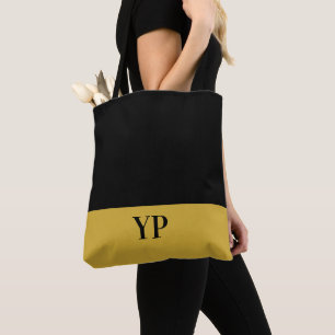 Bolso De Tela Monogramado simple negro y oro