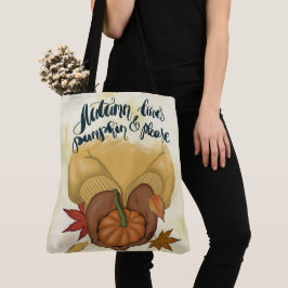 BOLSO DE TELA MUJER CON SUÉTER DORADO SOSTENIENDO CALABAZA PEQUE