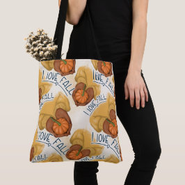 BOLSO DE TELA MUJER CON SUÉTER DORADO SOSTENIENDO CALABAZA PEQUE