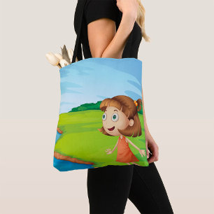 Bolso De Tela Niña junto al paisaje natural del río
