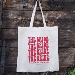 Bolso De Tela Novia personalizada Magenta Boho Boho Retro<br><div class="desc">¿Estás buscando el regalo perfecto para tu próxima fiesta de soltera? ¡No busque más que nuestras bolsas de tote personalizadas! Cada bolsa de tocador está fabricada con materiales de alta calidad y cuenta con un diseño único y moderno que se adapta perfectamente a tu estilo. Además, cada bolso de tocador...</div>