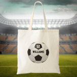 Bolso De Tela Número de nombre personalizado Bola de fútbol<br><div class="desc">Nombre personalizado y número de equipo regalo de fútbol. Diseñado por Thisisnotme©</div>