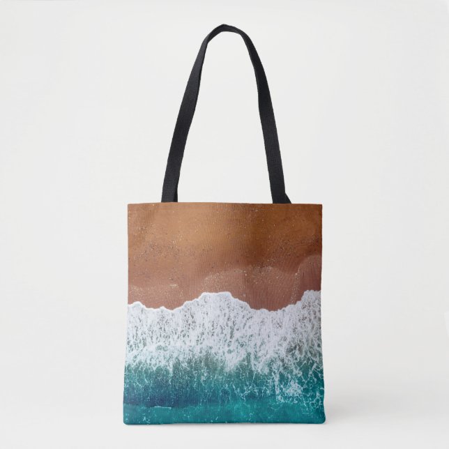 Bolso De Tela Ocean wave on a sandy beach, background  top view  (Anverso)