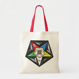 BOLSO DE TELA OES EN UNA ALMOHADA