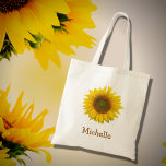 Bolso De Tela País Rústico del Girasol Amarillo<br><div class="desc">Bolsa de teta floral,  con una imagen de flor de girasol amarillo brillante. Con letras marrones,  puede personalizar el texto para hacer un gran accesorio personalizado. Perfecto para mantener tus objetos juntos cuando estás de viaje.</div>
