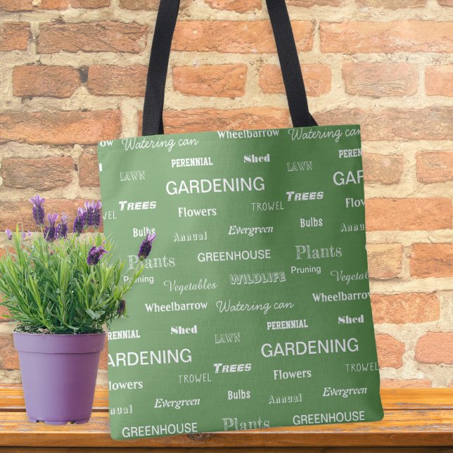 Bolso De Tela Palabras de jardinería para los jardineros y los a (With a pattern of gardening themed words in white on green, this tote bag is ideal for garden lovers)