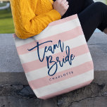 Bolso De Tela Pastel Coral Tiras Rosadas y Blancas Equipo Azul N<br><div class="desc">Bolsa de Tote todo-sobre-Print con las palabras "Team Bride" en escritura de moda azul contra fondo de rayas blancas y rosas de coral pastel. Perfecto para bodas de dama de honor, dama de honor y chica de flores. Para ver otros colores y elementos coincidentes, vea aquí https://www.zazzle.com/collections/119250194970828530?rf=238364477188679314 Personalízalo reemplazando el...</div>