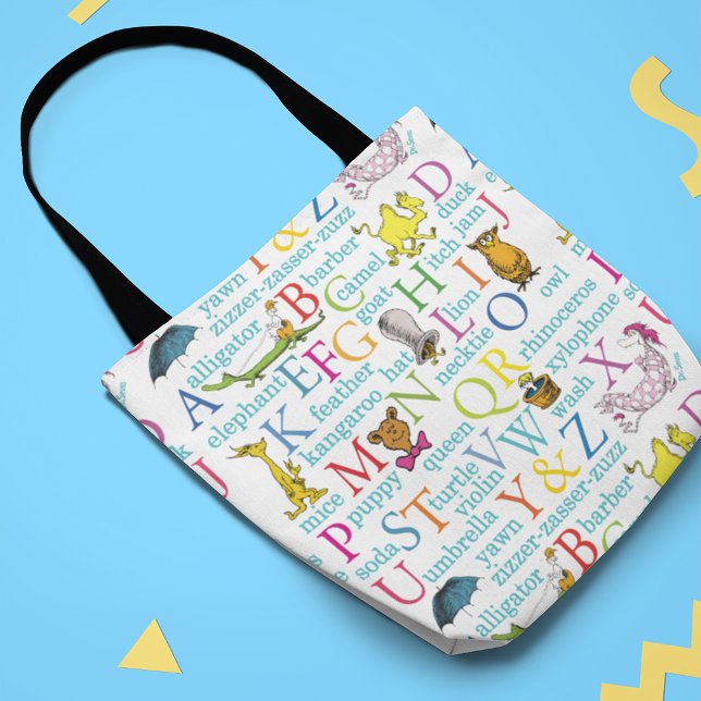Bolso De Tela Patrón ABC del Dr. Seuss con palabras (Tote bag laying on table)