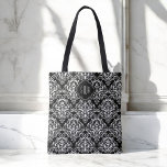 Bolso De Tela Patrón de Damasco en blanco y negro con monograma<br><div class="desc">Un bolso de moda con función y estilo, este diseño presenta un bonito patrón blanco de damasco sobre un fondo negro. Personalice con su monograma deseado reemplazando las iniciales de ejemplo que se muestran en la plantilla de texto fácil de usar. Es un regalo maravilloso para cualquier mujer en su...</div>
