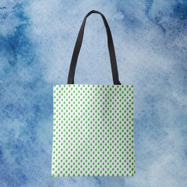 Bolso De Tela Patrón verde de frutas de Apple (A tote bag with a pattern of green apples.)