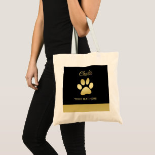 Bolso De Tela Paw dorada de perro brillante sobre fondo negro