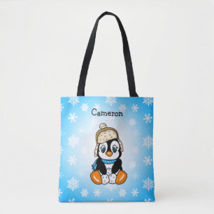 Bolso De Tela Pequeño pingüino en la gorra de invierno con bolas