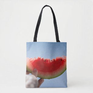 Bolso De Tela Persona sosteniendo sandía en rodajas