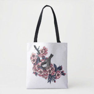 Bolso De Tela Pollo en una rama de cerezo floreciente