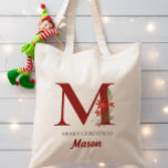 Bolso De Tela Presente de Navidad de Monograma Personalizado<br><div class="desc">Este monograma y diseño de nombres personalizados para Navidades es perfecto tanto para niños como para adultos. Esto se puede imprimir con cualquier nombre y letra. ¡Fácil de editar y de imprimir! Esto hace un regalo perfecto para los Navidades, el relleno, el intercambio de regalos de vacaciones o el uso...</div>