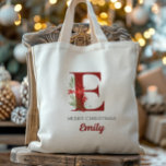 Bolso De Tela Presente de Navidad de Monograma Personalizado<br><div class="desc">Este monograma y diseño de nombres personalizados para Navidades es perfecto tanto para niños como para adultos. Esto se puede imprimir con cualquier nombre y letra. ¡Fácil de editar y de imprimir! Esto hace un regalo perfecto para los Navidades, el relleno, el intercambio de regalos de vacaciones o el uso...</div>