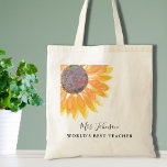 Bolso De Tela Profesora de girasol rústico<br><div class="desc">Esta bolsa de té rústica y florida está decorada con un girasol acuático en tonos amarillos. Personalizable fácil. Para seguir editando, utilice la Herramienta de diseño para cambiar el tipo de letra, el tamaño de la fuente o el color. Porque creamos nuestra obra de arte no encontrarás esta imagen exacta...</div>