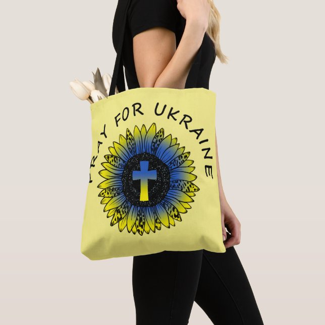 Bolso De Tela Rezar por Ucrania giratoria y cruza (Detalle)