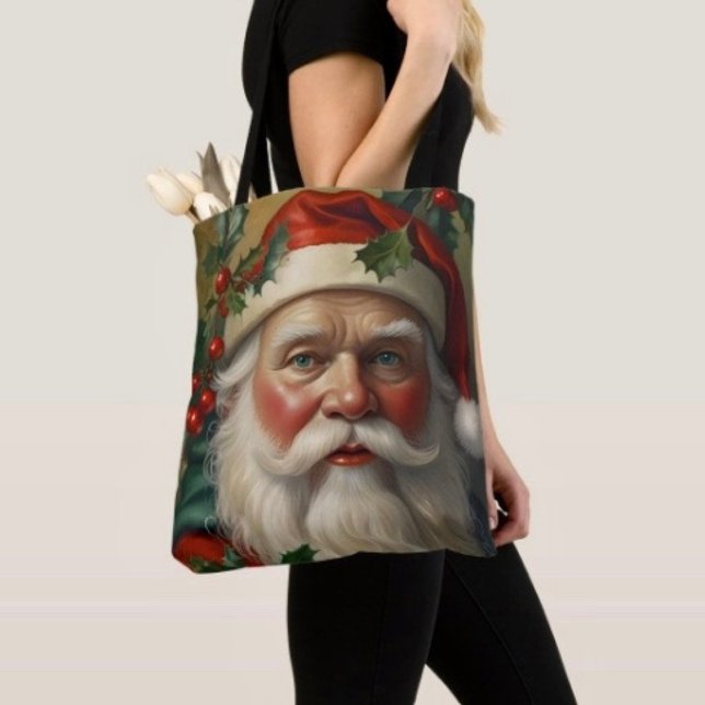 Bolso De Tela Santa Con Muérdago (Tote Bag — 100% polyester, black laminated lining 100% cotton web hand. Made in the USA.
)