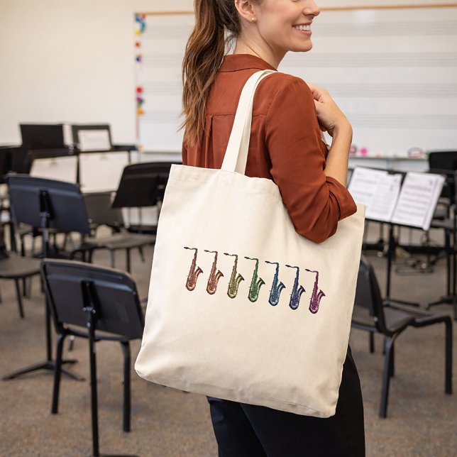 Bolso De Tela Saxofones Tenores Arcoíris (A tote bag with a fun rainbow saxophone design.)