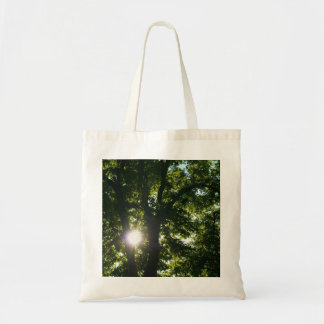 Bolso De Tela Sol brillando a través de árboles