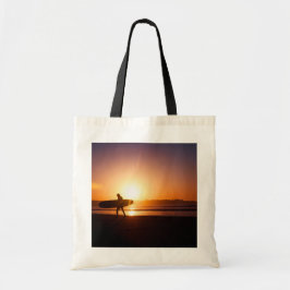 Bolso De Tela Surfista en la playa al atardecer