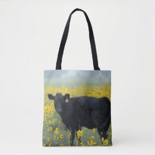 Bolso De Tela Ternero negro en un campo de girasoles