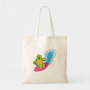 Bolso De Tela Tortuga como surfista con tabla de surf