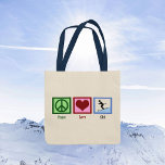 Bolso De Tela Trayecto de esquí con amor por la paz<br><div class="desc">Un lindo regalo de bolso de teta para un esquiador ávido al que le encanta llevar a las pistas en invierno. Una señal de paz,  corazón,  y una persona en esquís asando por una montaña nevada de azul bonito. Un fresco regalo de Navidad para esquiar.</div>