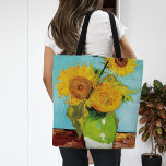 Bolso De Tela Tres girasoles | Vincent Van Gogh<br><div class="desc">Tres girasoles (1888) del artista holandés Vincent Van Gogh. La pintura original de arte fino es un óleo sobre lienzo que representa una vida quieta de girasoles amarillos brillantes con un fondo turquesa. Utilice las herramientas de diseño para agregar texto personalizado o personalizar la imagen.</div>