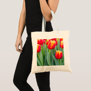 Bolso De Tela Tulipanes rojos y amarillos vibrantes en jardín de