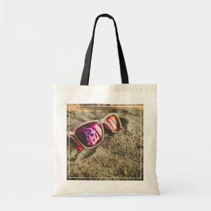 Bolso De Tela Un par de gafas de sol de moda en la playa