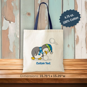 Bolso De Tela Un pingüino pequeño con una bolsita de nieve