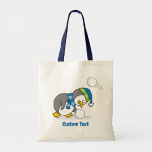 Bolso De Tela Un pingüino pequeño con una bolsita de nieve