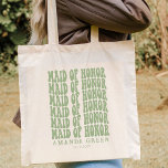 Bolso De Tela Una doncella de honor personalizada de Sage Green<br><div class="desc">¿Estás planeando una fiesta de soltera pero no sabes qué traer? Echa un vistazo a nuestras bolsas de tote de nuestra doncella verde de honor grupo de soltera de sage personalizado. Estos totes son perfectos para llevar todas sus pertenencias al boda y desde él. Podemos personalizarlos con cualquier nombre, monograma...</div>