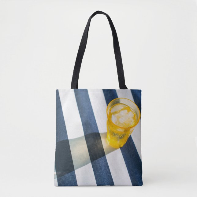 Bolso De Tela Vidrio transparente con líquido amarillo (Anverso)