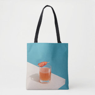 Bolso De Tela Vidrio transparente con líquido marrón