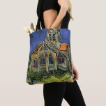Bolso De Tela Vincent van Gogh - La Iglesia de Auvers<br><div class="desc">La Iglesia de Auvers (1890) de Vincent van Gogh es una pintura religiosa de la arquitectura del arte del arte de la época del Impresionismo. Una mujer camina por un camino hacia la capilla del pueblo con hermosas vidrieras. Una escena de la arquitectura de la vida cotidiana. Sobre el artista:...</div>