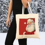 Bolso De Tela Vintage Christmas, Jolly Santa Claus Winning<br><div class="desc">Diseño de vacaciones de Navidades de ilustracion de época con Santa Claus con un guiño. Jolly San Nicolás lleva un gorra y hace el guiño como si tuviera un secreto. Ho,  ho,  ho,  ¡Feliz Navidad!</div>