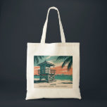 Bolso De Tela Vintage Miami Florida South Beach Skyline Travel<br><div class="desc">Celebrate the vibrant character of Miami with this vintage South Beach skyline artwork. A colorful lifeguard tower rises above golden sands and turquoise waves, framed by lush tropical palms and glowing sunset skies. Inspired by retro travel posters, this pastel-toned illustration captures the laid-back atmosphere and timeless charm of Florida’s most...</div>