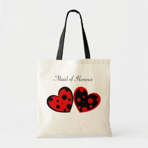 Bolso rojo y negro de los corazones