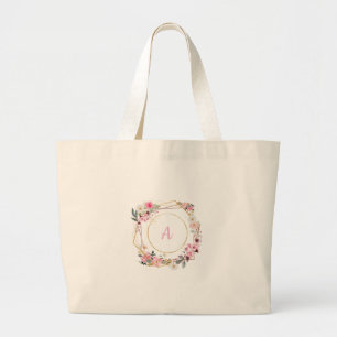 Bolso tote geométrico dorado con flores rosadas