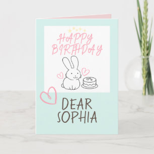 Bonita tarjeta de cumpleaños de conejo y pastelito