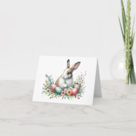 Bonito con tarjeta de Pascua, conejo y flores