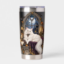 GATO BLANCO CON TEMA DE HALLOWEEN EN VENTANA