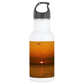 BOTELLA DE AGUA ATARDECER LLAMEANTE EN EL OCÉANO PACÍFICO