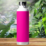 Botella De Agua Color sólido neón rosado<br><div class="desc">Un rosa vibrante y electrizante,  lleno de energía y emoción. Recordatorio de los signos de neón que iluminan la bulliciosa vida nocturna de una ciudad o los vivos tonos de las flores tropicales,  este color es audaz,  lúdico y sin remordimientos. Perfecto para hacer una declaración llamativa.</div>